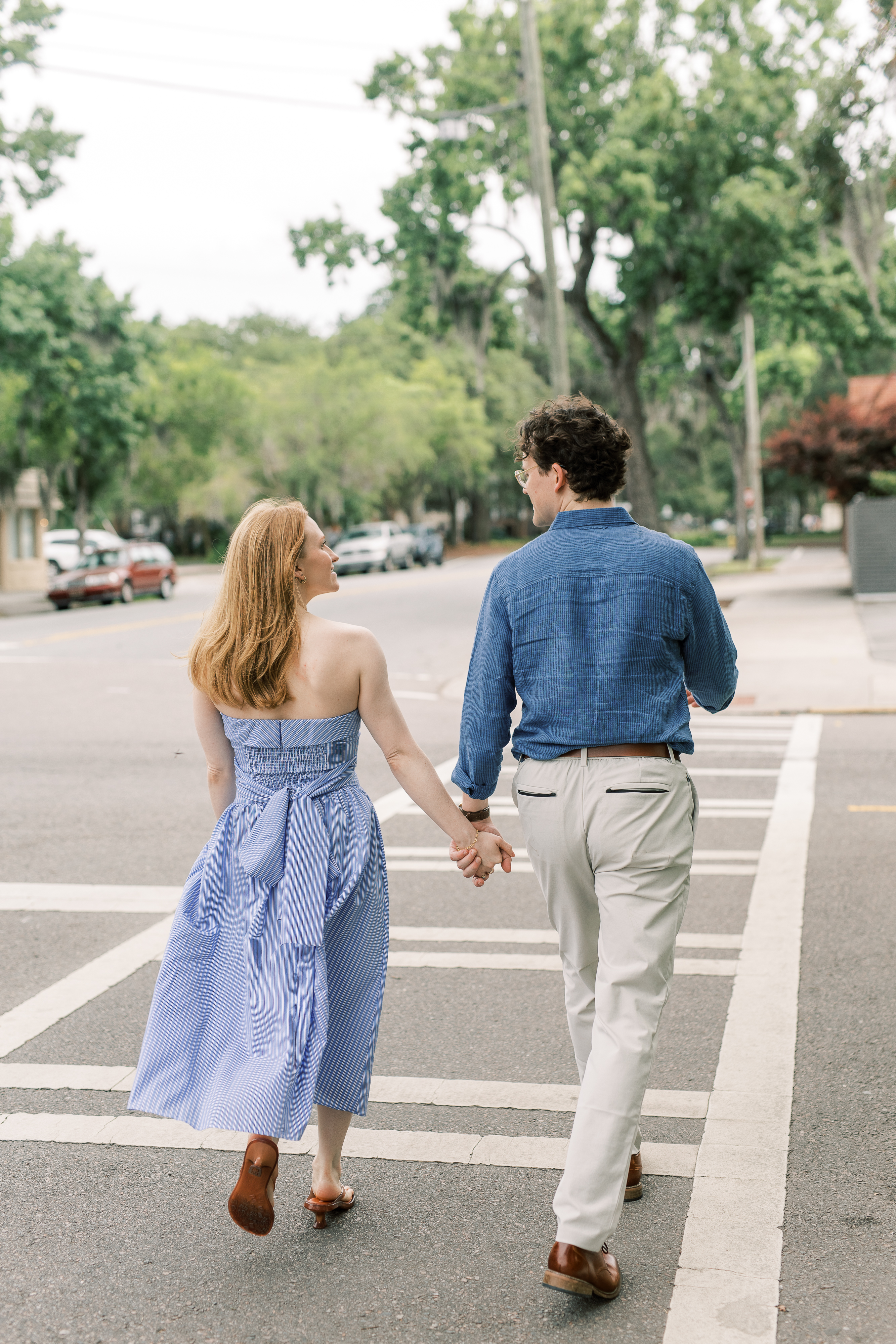 Morgan and Brendan embracing during golden-hour engagement photos