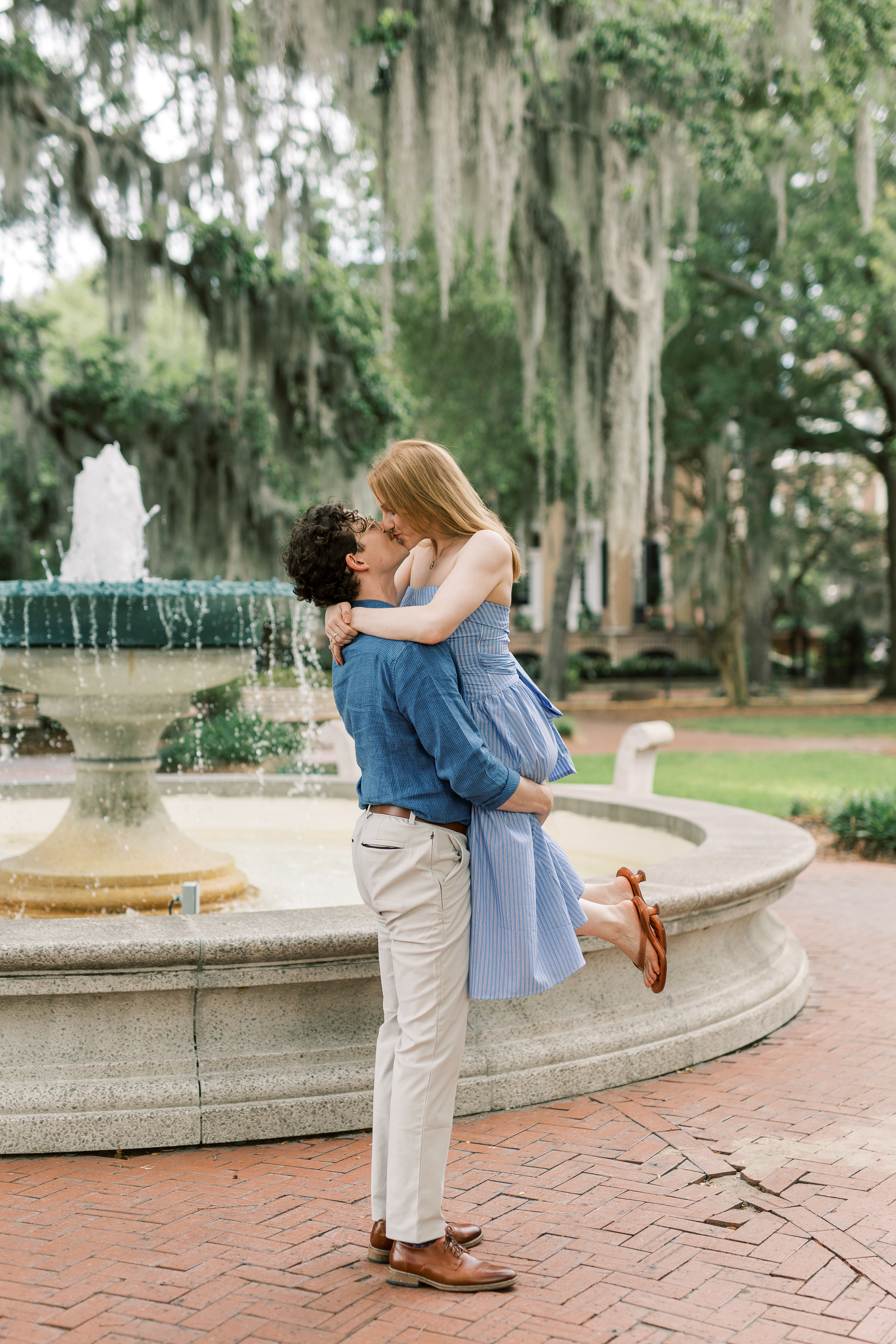 Morgan and Brendan standing together for an engagement portrait
