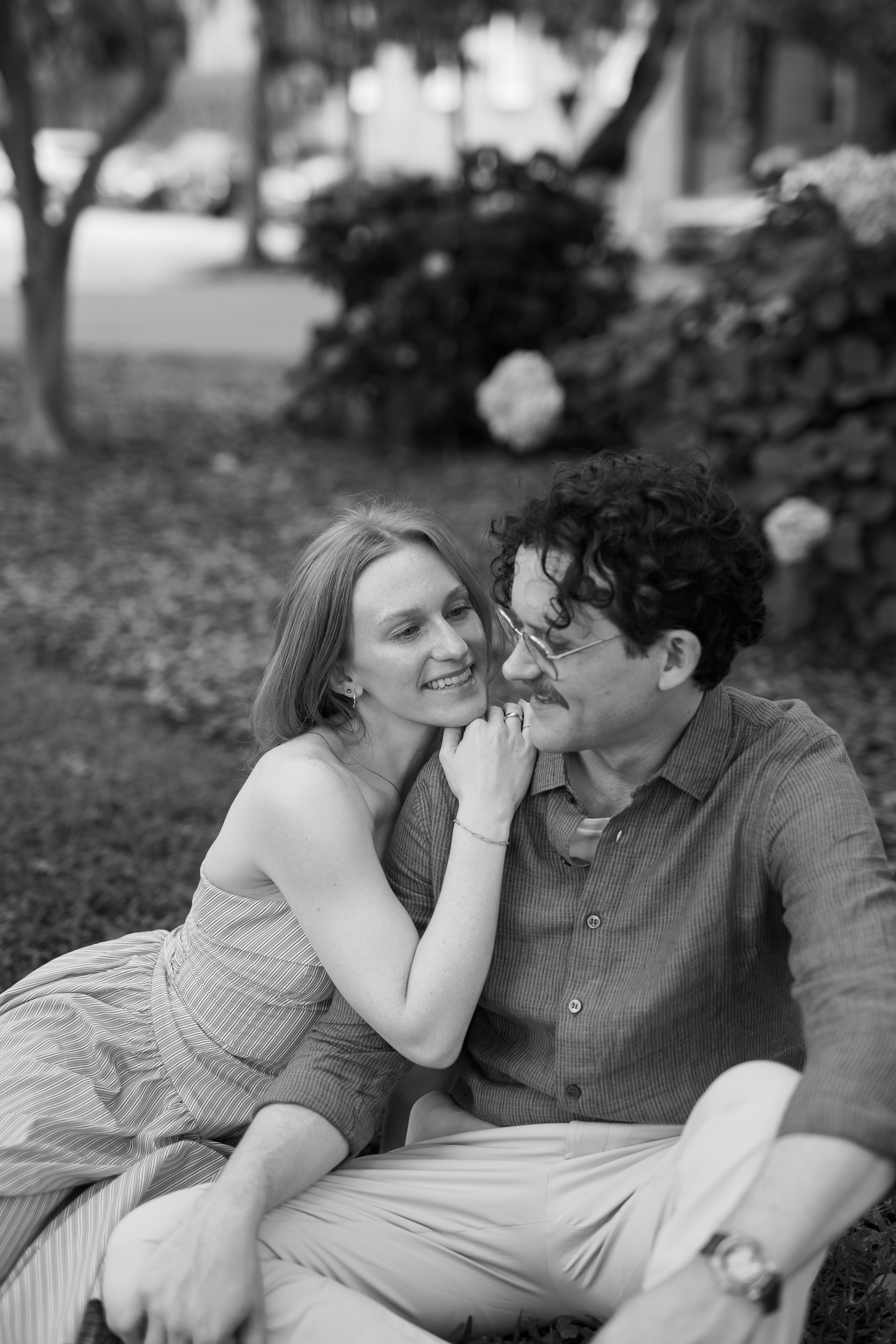 Morgan and Brendan sharing a soft engagement portrait in Savannah